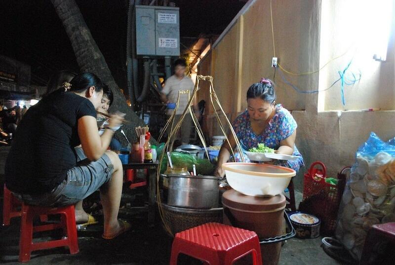 Hoi An travel guide recommends enjoying local cuisine for a complete experience